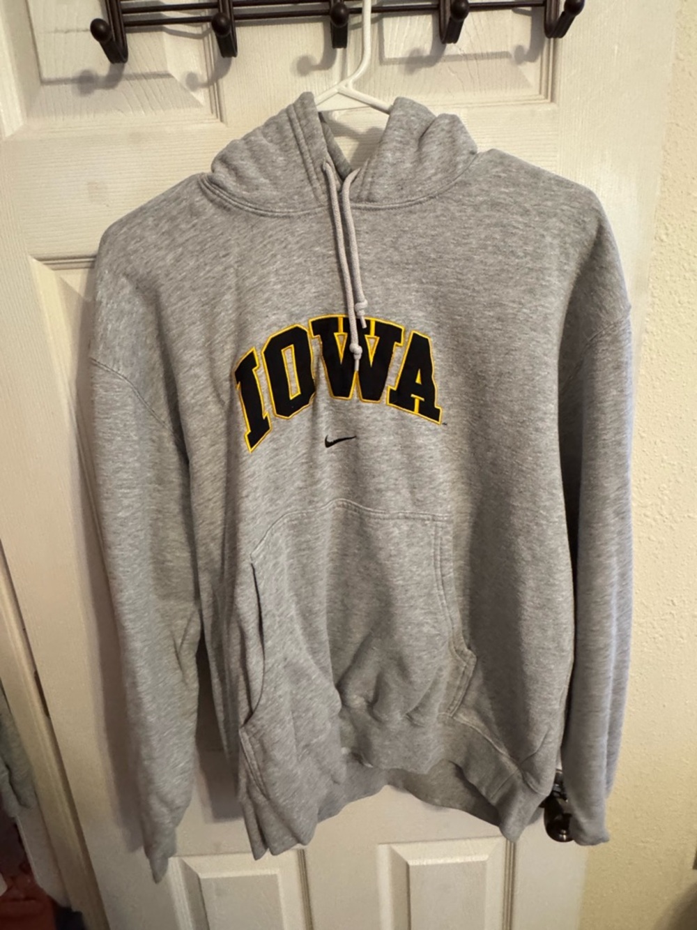 Nike Grey Hoodie with Iowa Black and Gold Arch Logo